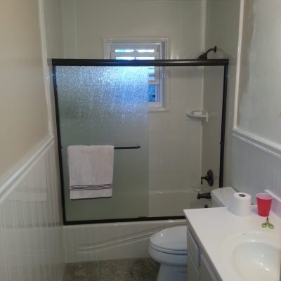 A Bathtub and Shower with Sliding Glass Door| Bathtub Replacement in Montgomery, AL
